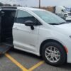 White Chrysler Pacifica with Driverge Side Entry Automatic Fold Out conversion