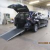 Blue Toyota Sienna with Driverge Rear Entry Manual Fold Out conversion