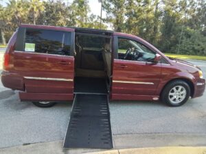 Chrysler Town and Country with Adaptive Vans Side Entry Automatic Fold Out conversion