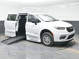 White Chrysler Pacifica with BraunAbility Side Entry Automatic Fold Out conversion