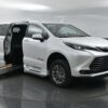 White Toyota Sienna with BraunAbility Side Entry Automatic Fold Out conversion