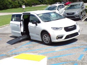 White Chrysler Pacifica with BraunAbility Side Entry Automatic Fold Out conversion