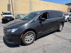 Black Chrysler Voyager with Driverge Side Entry Automatic Fold Out conversion