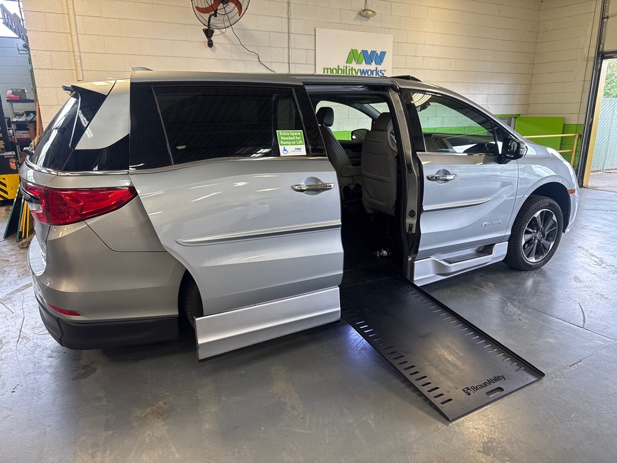 Silver Honda Odyssey with BraunAbility Side Entry Automatic In Floor conversion