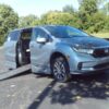 Silver Honda Odyssey with BraunAbility Side Entry Automatic In Floor conversion