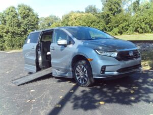 Silver Honda Odyssey with BraunAbility Side Entry Automatic In Floor conversion