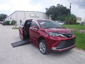 Red Toyota Sienna with BraunAbility Side Entry Automatic In Floor conversion