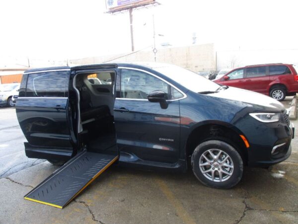 Blue Chrysler Pacifica with Driverge Side Entry Automatic Fold Out conversion