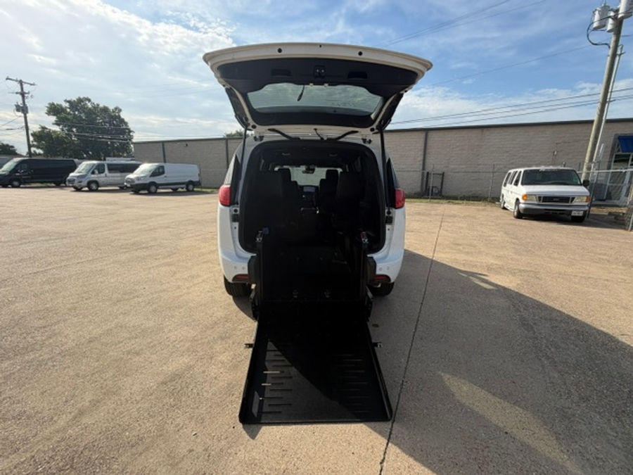 White Chrysler Voyager with FR Conversions Rear Entry Manual Fold Out conversion