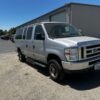 Silver Ford Econoline with Norcal Side Entry Automatic Fold Out conversion