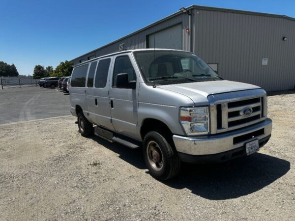 Silver Ford Econoline with Norcal Side Entry Automatic Fold Out conversion