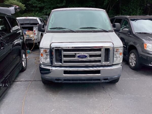 White Ford Econoline with Other Rear Entry Automatic Fold Out conversion