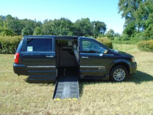 Black Chrysler Town and Country with BraunAbility Side Entry Automatic Fold Out conversion