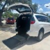 White Chrysler Voyager with FR Conversions Rear Entry Manual Fold Out conversion