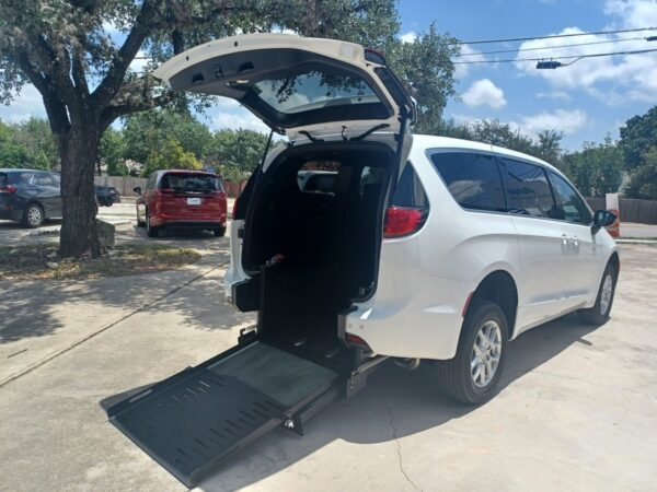 White Chrysler Voyager with FR Conversions Rear Entry Manual Fold Out conversion