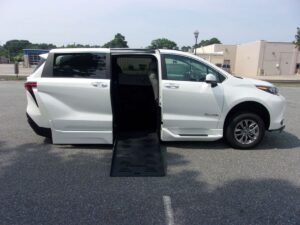 White Toyota Sienna with BraunAbility Side Entry Automatic Fold Out conversion