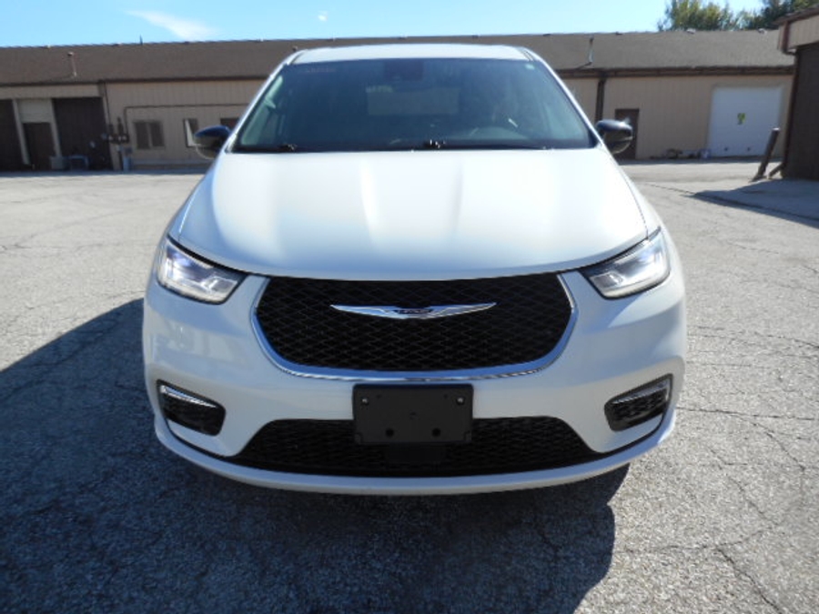 White Chrysler Pacifica with FR Conversions Rear Entry Manual Fold Out conversion