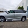 Silver Chrysler Voyager with BraunAbility Side Entry Automatic In Floor conversion
