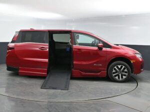 Red Honda Odyssey with BraunAbility Side Entry Automatic In Floor conversion