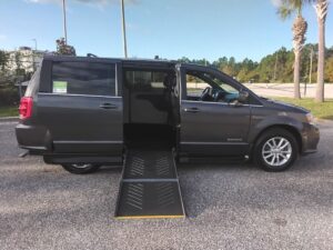 Grey Dodge Grand Caravan with Driverge Side Entry Automatic Fold Out conversion