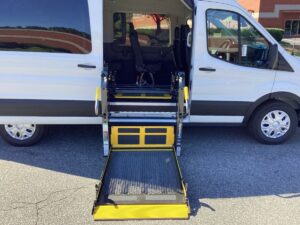 White Ford Transit with Driverge Side Entry Automatic Fold Out conversion