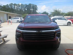 Red Chevrolet Traverse with BraunAbility Side Entry Automatic In Floor conversion