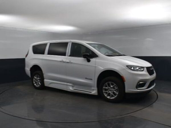 White Chrysler Pacifica with BraunAbility Rear Entry Manual Fold Out conversion