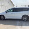 White Chrysler Voyager with Driverge Side Entry Automatic Fold Out conversion