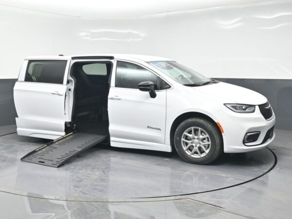 White Chrysler Pacifica with BraunAbility Side Entry Automatic Fold Out conversion