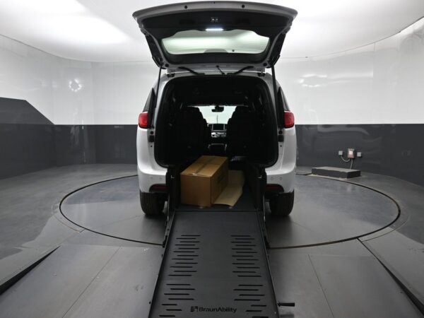 White Chrysler Voyager with BraunAbility Rear Entry Manual Fold Out conversion