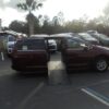 Red Chrysler Voyager with BraunAbility Side Entry Automatic Fold Out conversion