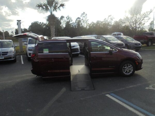 Red Chrysler Voyager with BraunAbility Side Entry Automatic Fold Out conversion