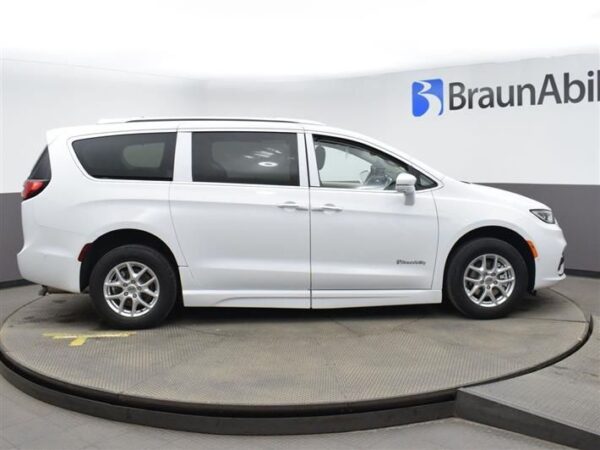 White Chrysler Pacifica with BraunAbility Side Entry Automatic Fold Out conversion