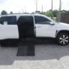 White Chevrolet Traverse with BraunAbility Side Entry Automatic In Floor conversion