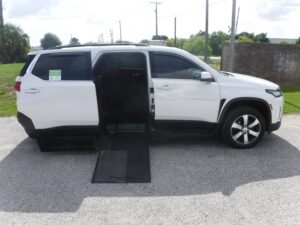 White Chevrolet Traverse with BraunAbility Side Entry Automatic In Floor conversion