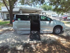 Silver Chrysler Pacifica with BraunAbility Side Entry Automatic Fold Out conversion