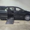 Black Chrysler Voyager with Driverge Side Entry Automatic Fold Out conversion