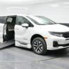 White Honda Odyssey with BraunAbility Side Entry Automatic In Floor conversion