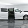 White Chrysler Pacifica with BraunAbility Side Entry Automatic Fold Out conversion