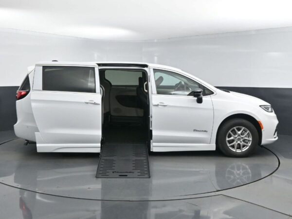 White Chrysler Pacifica with BraunAbility Side Entry Automatic Fold Out conversion