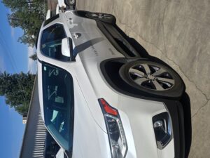 White Chevrolet Traverse with BraunAbility Side Entry Automatic In Floor conversion