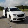 White Chrysler Pacifica with BraunAbility Side Entry Automatic Fold Out conversion