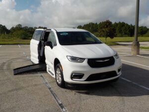 White Chrysler Pacifica with BraunAbility Side Entry Automatic Fold Out conversion
