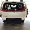 White Chrysler Pacifica with BraunAbility Rear Entry Manual Fold Out conversion