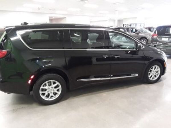 Black Chrysler Pacifica with Driverge Rear Entry Manual Fold Out conversion