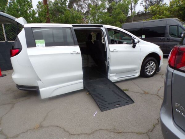 White Chrysler Voyager with BraunAbility Side Entry Automatic Fold Out conversion