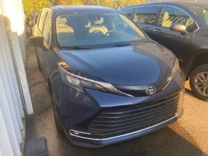 Blue Toyota Sienna with Driverge Rear Entry Manual Fold Out conversion