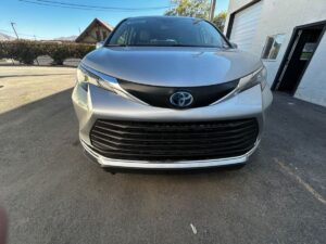 Silver Toyota Sienna with BraunAbility Side Entry Automatic Fold Out conversion