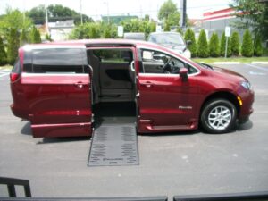 Red Chrysler Voyager with BraunAbility Side Entry Automatic Fold Out conversion