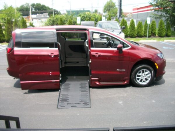 Red Chrysler Voyager with BraunAbility Side Entry Automatic Fold Out conversion